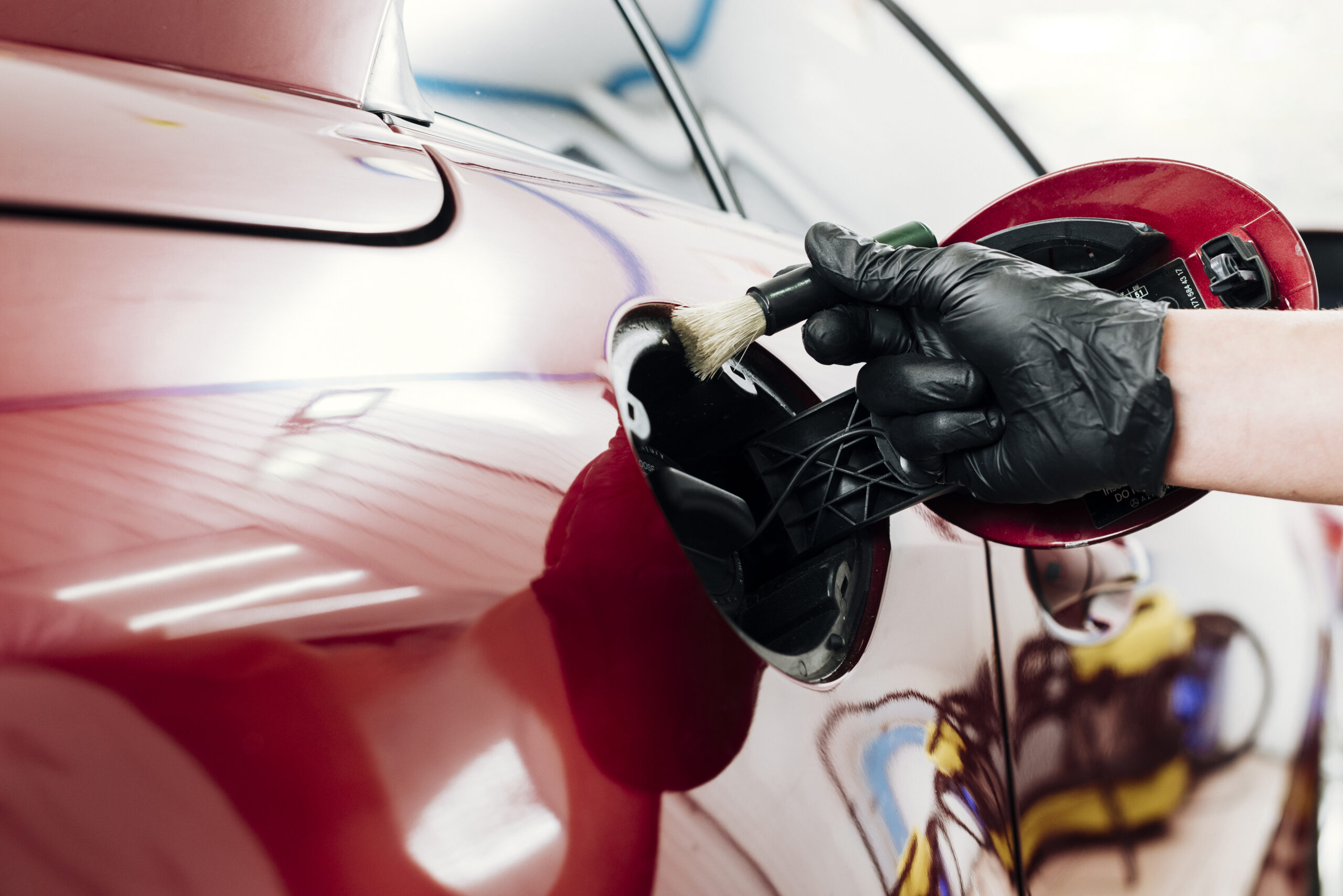 close-up-person-cleaning-car-exterior